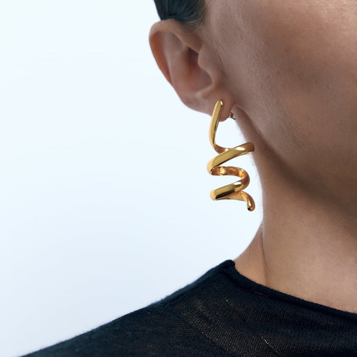 Spiraal Oorbel - Een Tijdloos Accent voor Jouw Stijl!